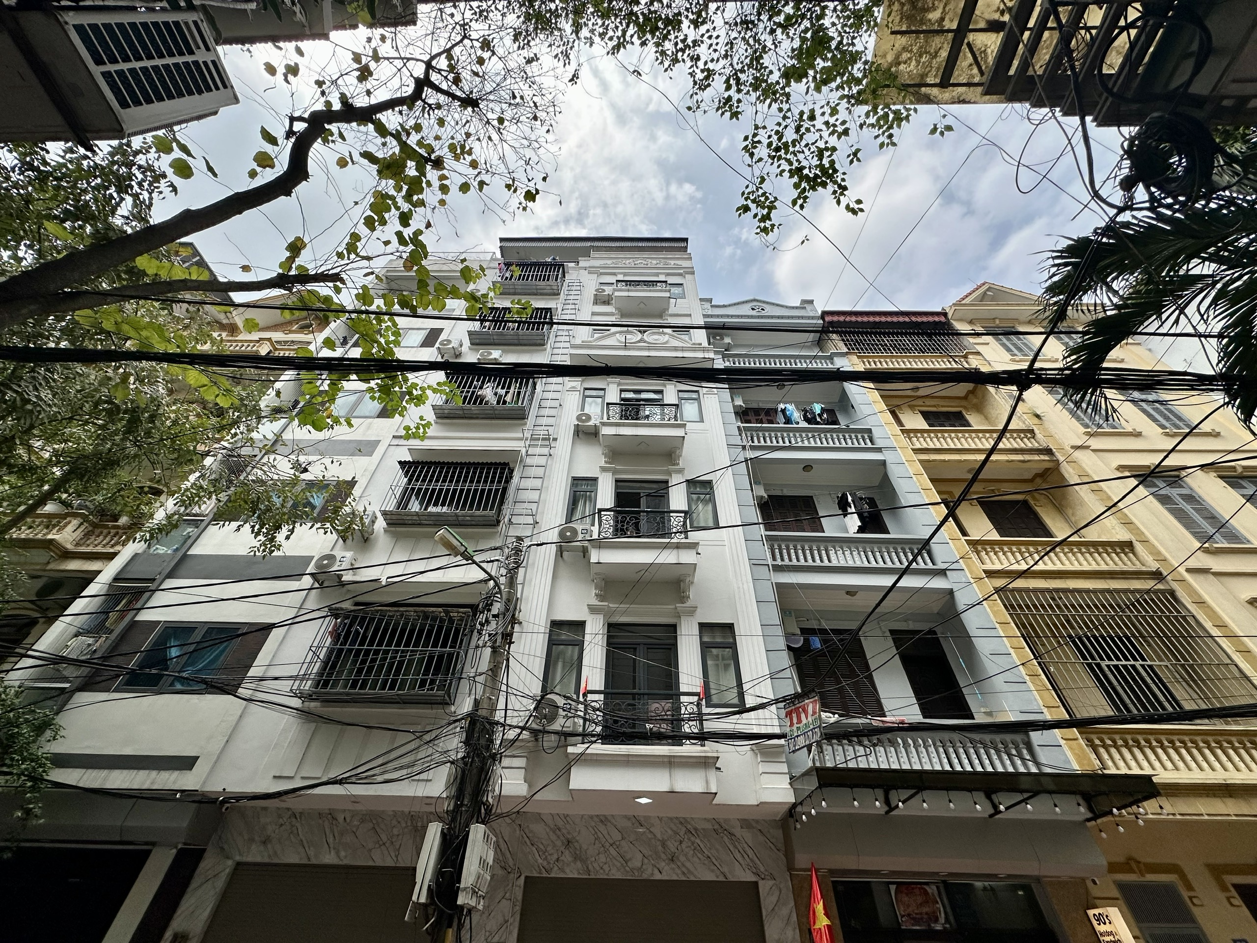  (Tin thật 100%). Bán nhà 2 mặt tiền 68m2 x 7T tại Trần Vỹ - Phân lô ô tô tránh - Dòng tiền 1 tỷ/năm 