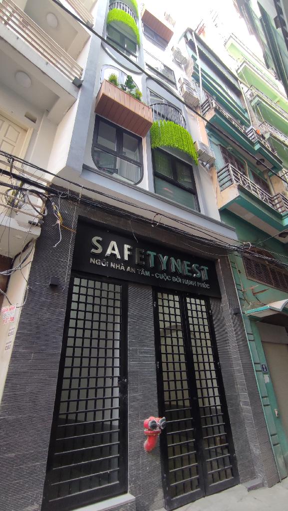  CÁCH 2 NHÀ RA PHỐ TRẦN DUY HƯNG -THANG MÁY -NGÕ THÔNG -DÒNG TIỀN ~ 80 TRIỆU/ THÁNG _63M2 